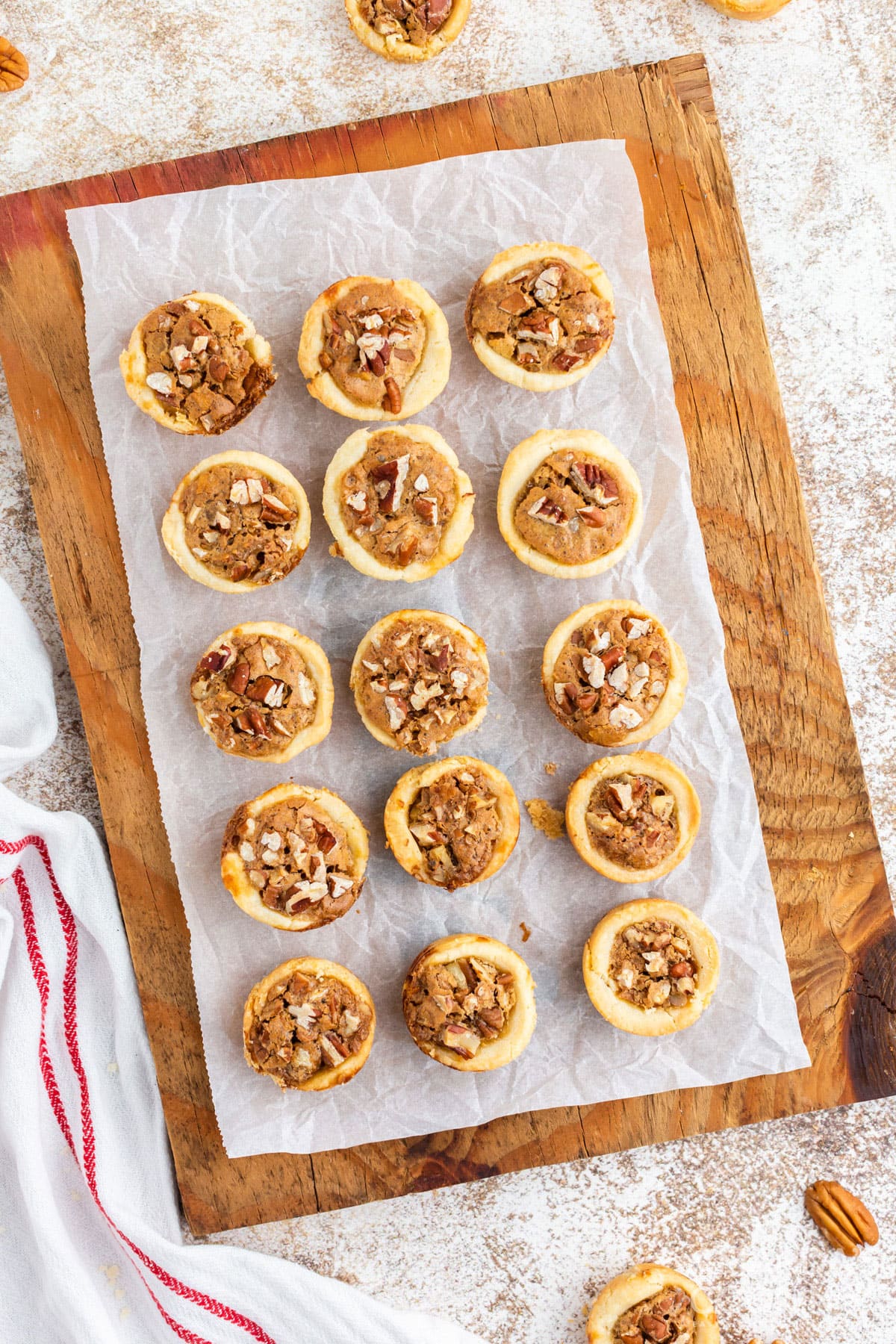 pecan tassies on a cutting board