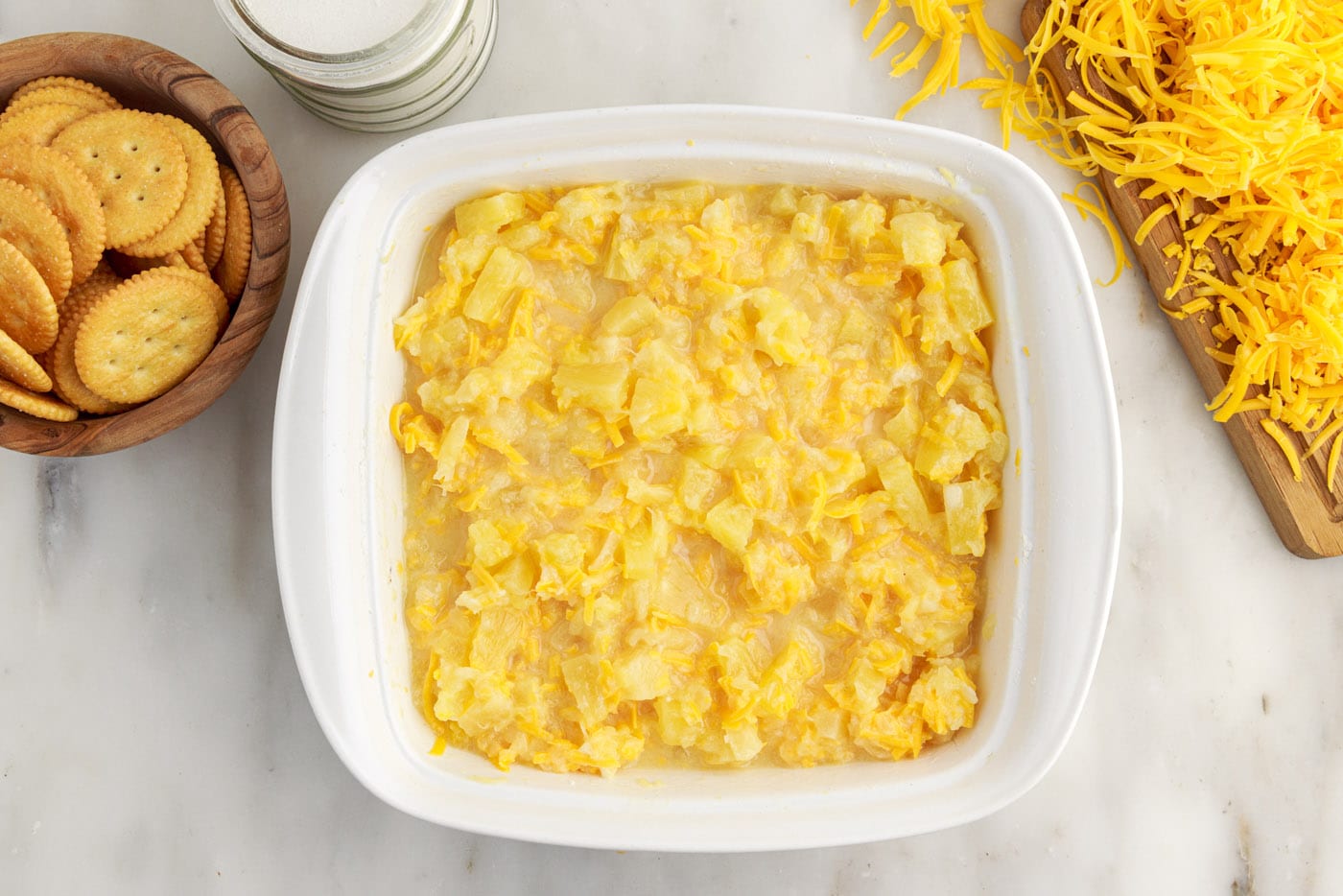 pineapple casserole filling in a baking dish