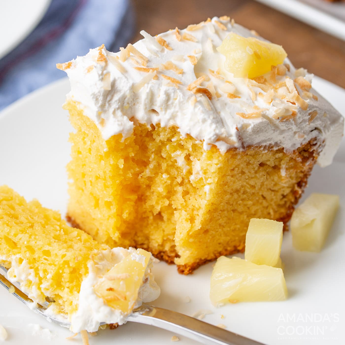 slice of pineapple poke cake