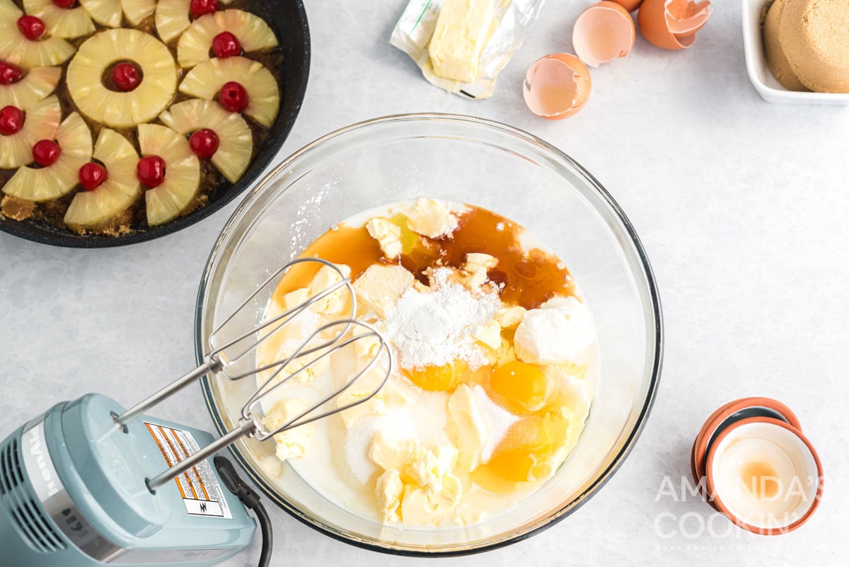 pineapple upside down cake ingredients in a mixing bowl