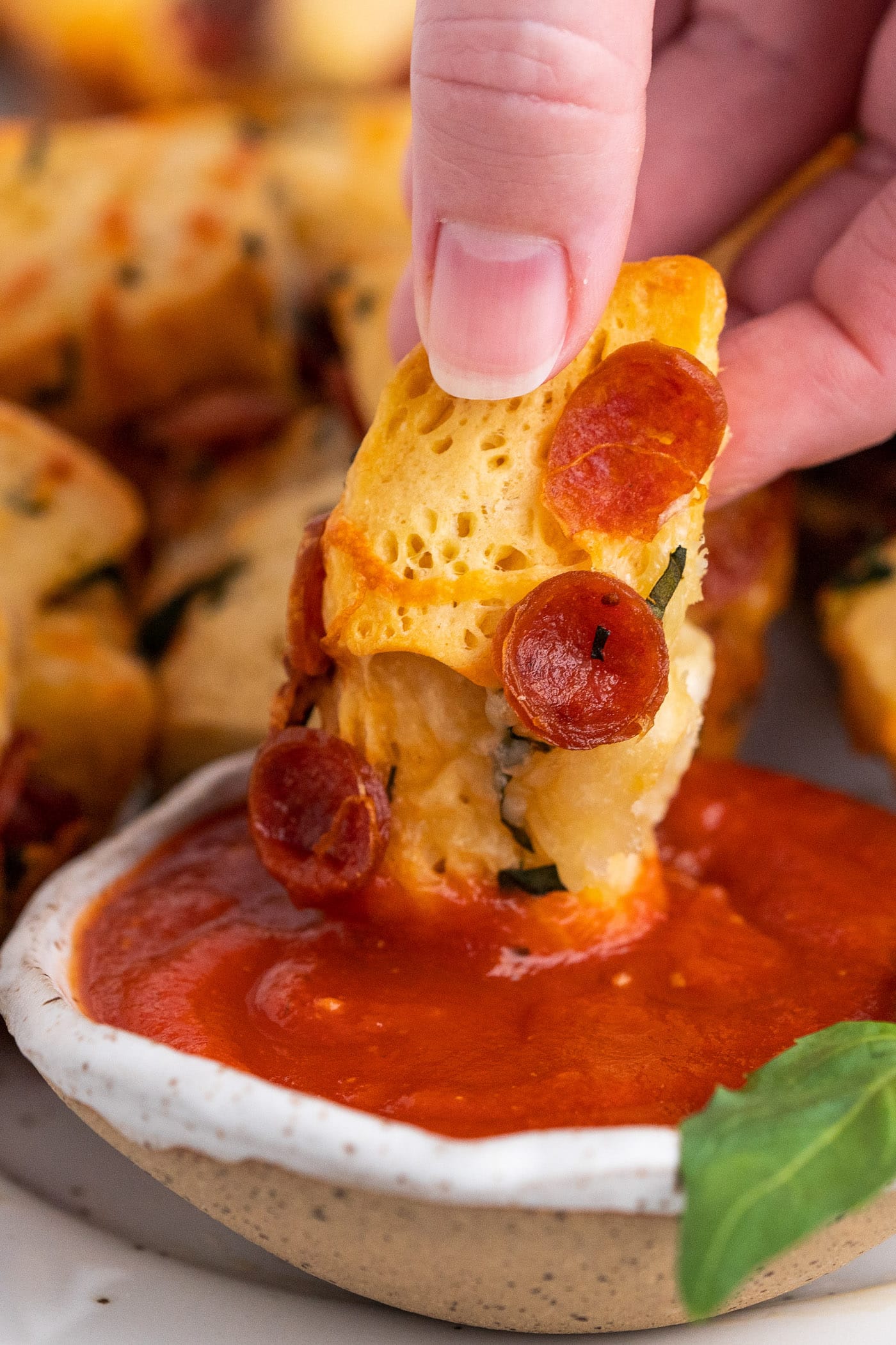 dipping a pizza bite