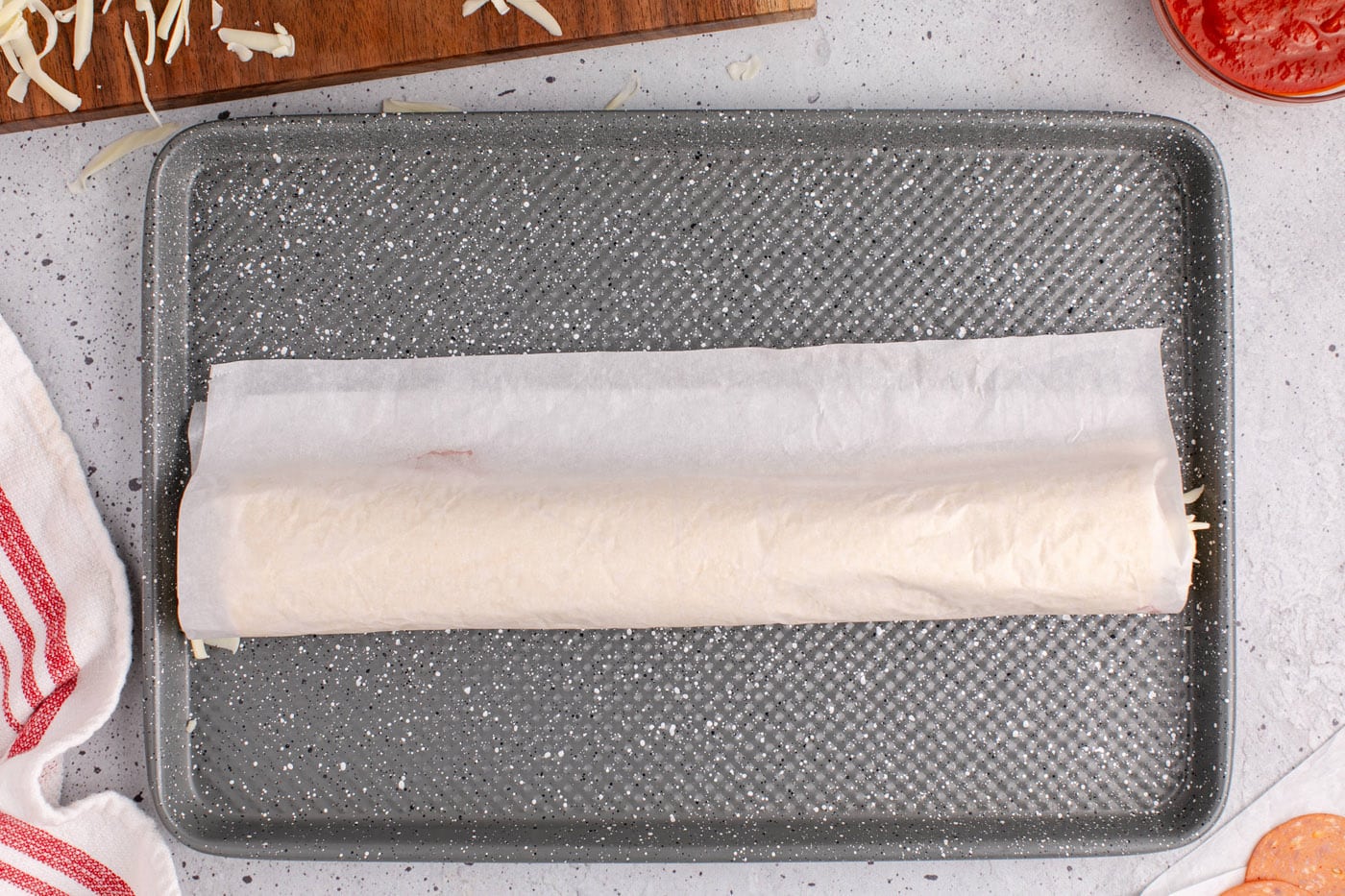 crescent roll dough rolled into a log