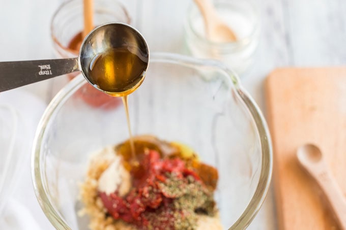 adding honey to bowl