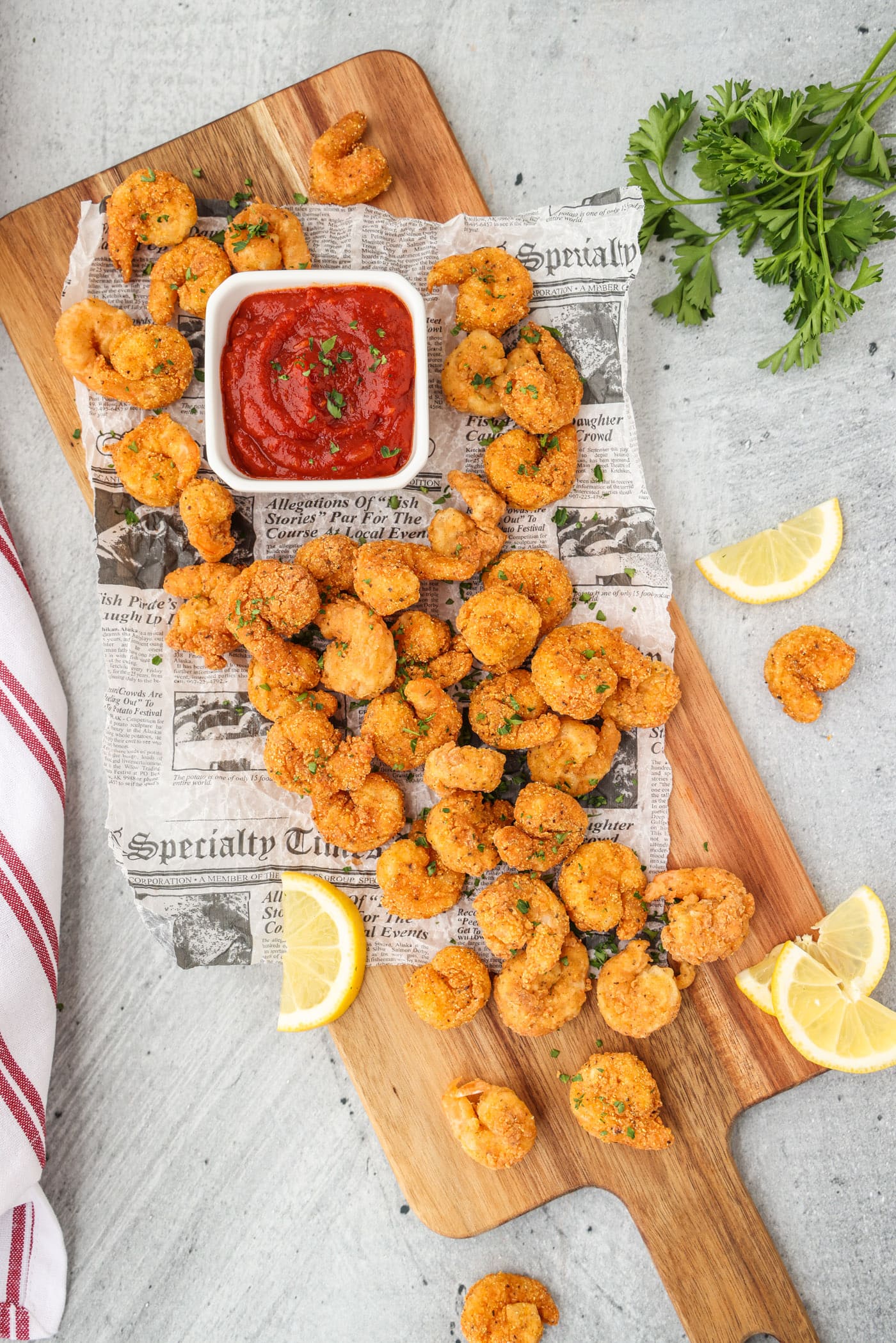 Popcorn Shrimp on a cutting board