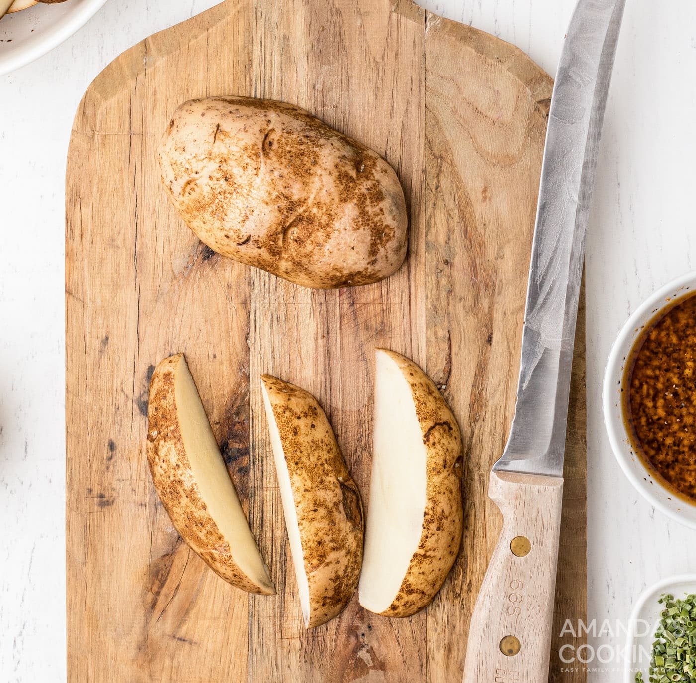 cutting potatoes into wedges