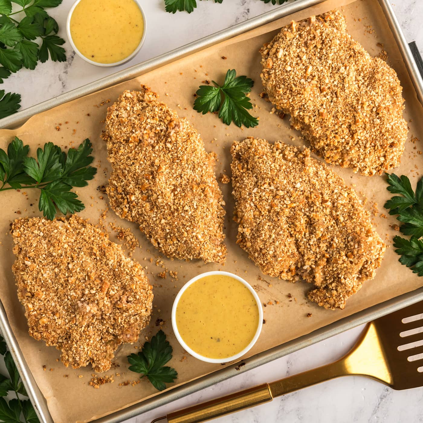 Pretzel Chicken on a baking sheet