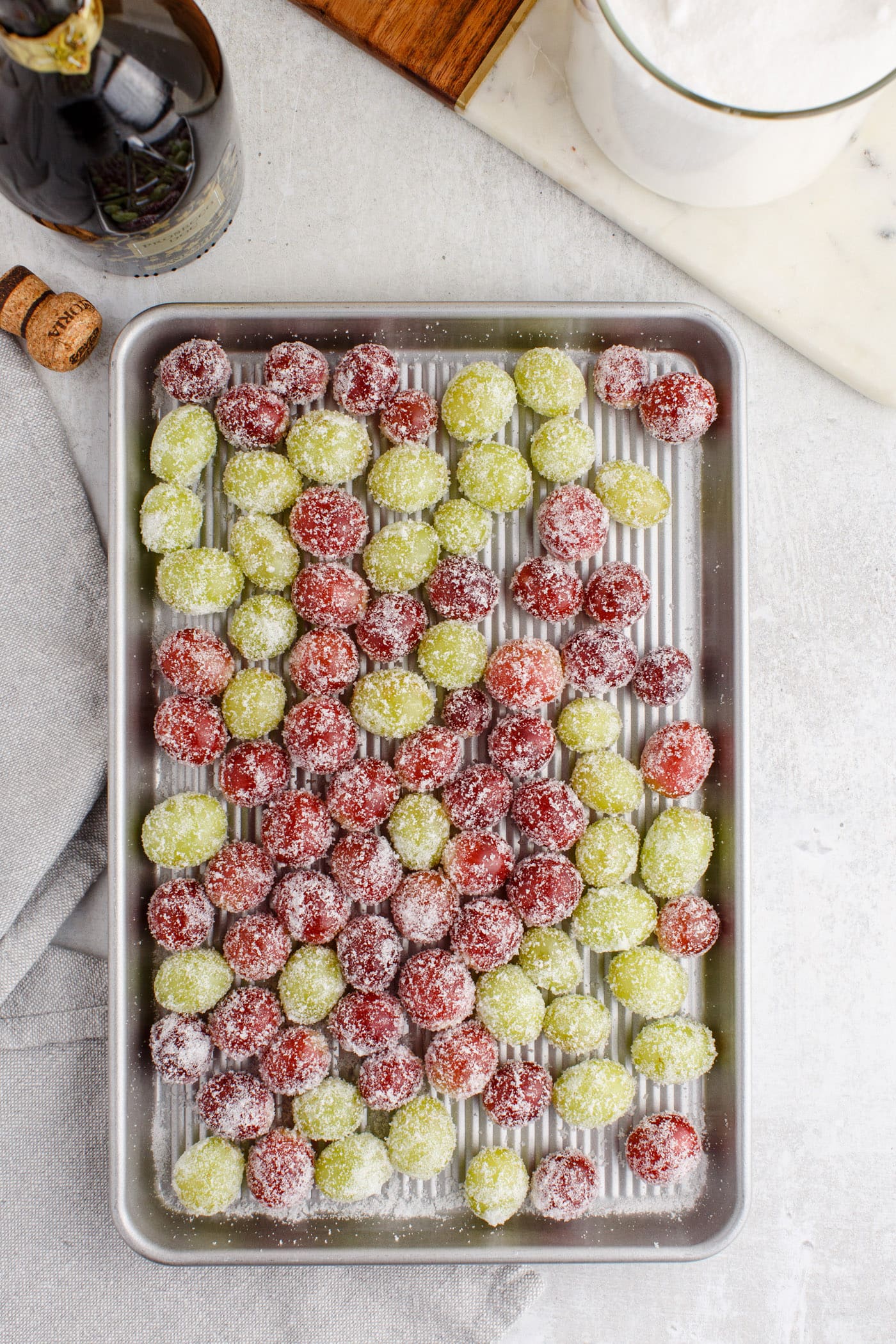 sugared vodka grapes on a baking sheet