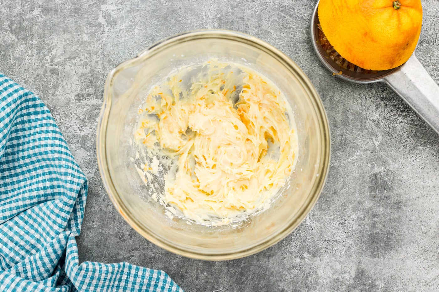Orange roll filling in a mixing bowl