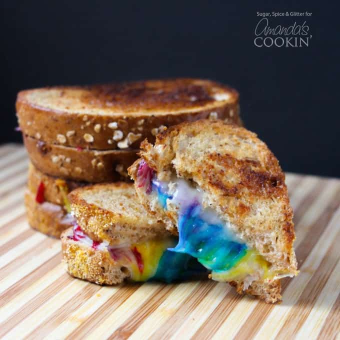 rainbow grilled cheese sandwich cut in half