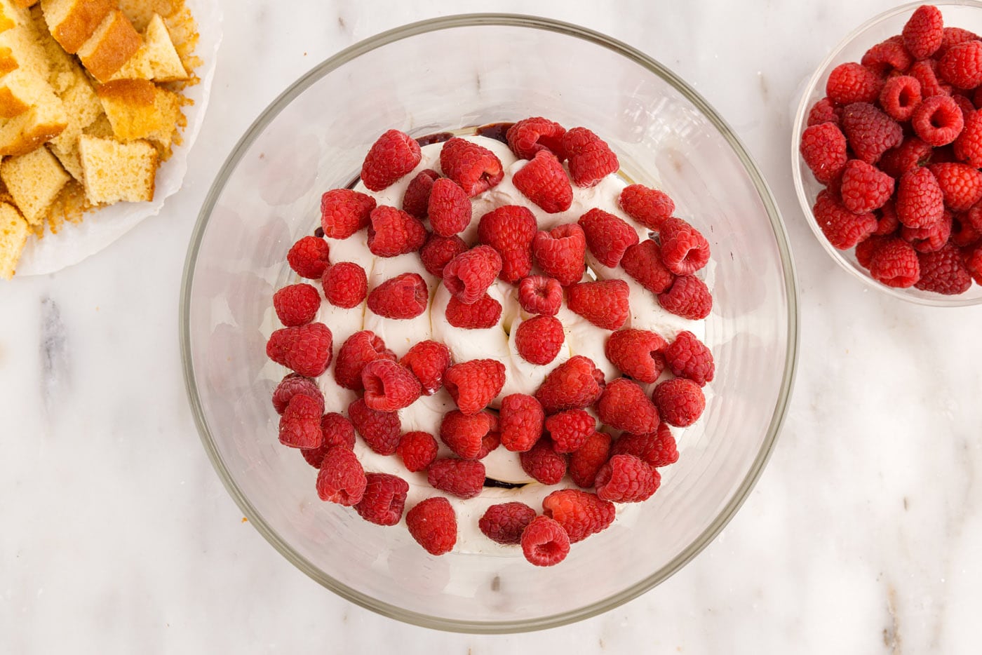 fresh raspberries added on top of cream cheese mixture
