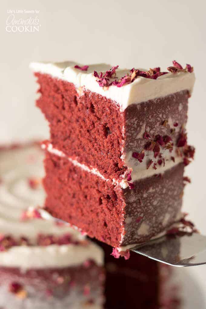 slice of red velvet cake with cream cheese frosting