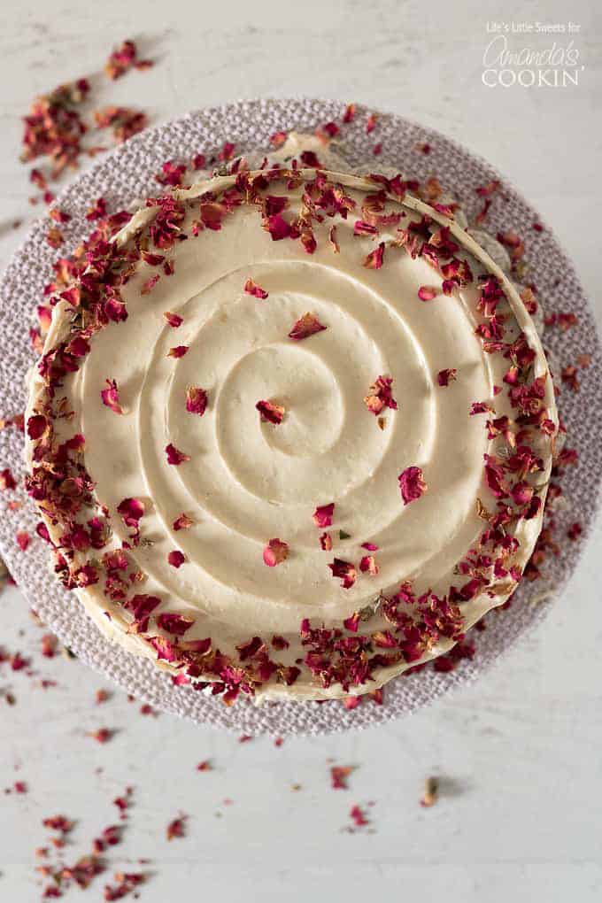 Red velvet cake overhead shot with edible rose petals