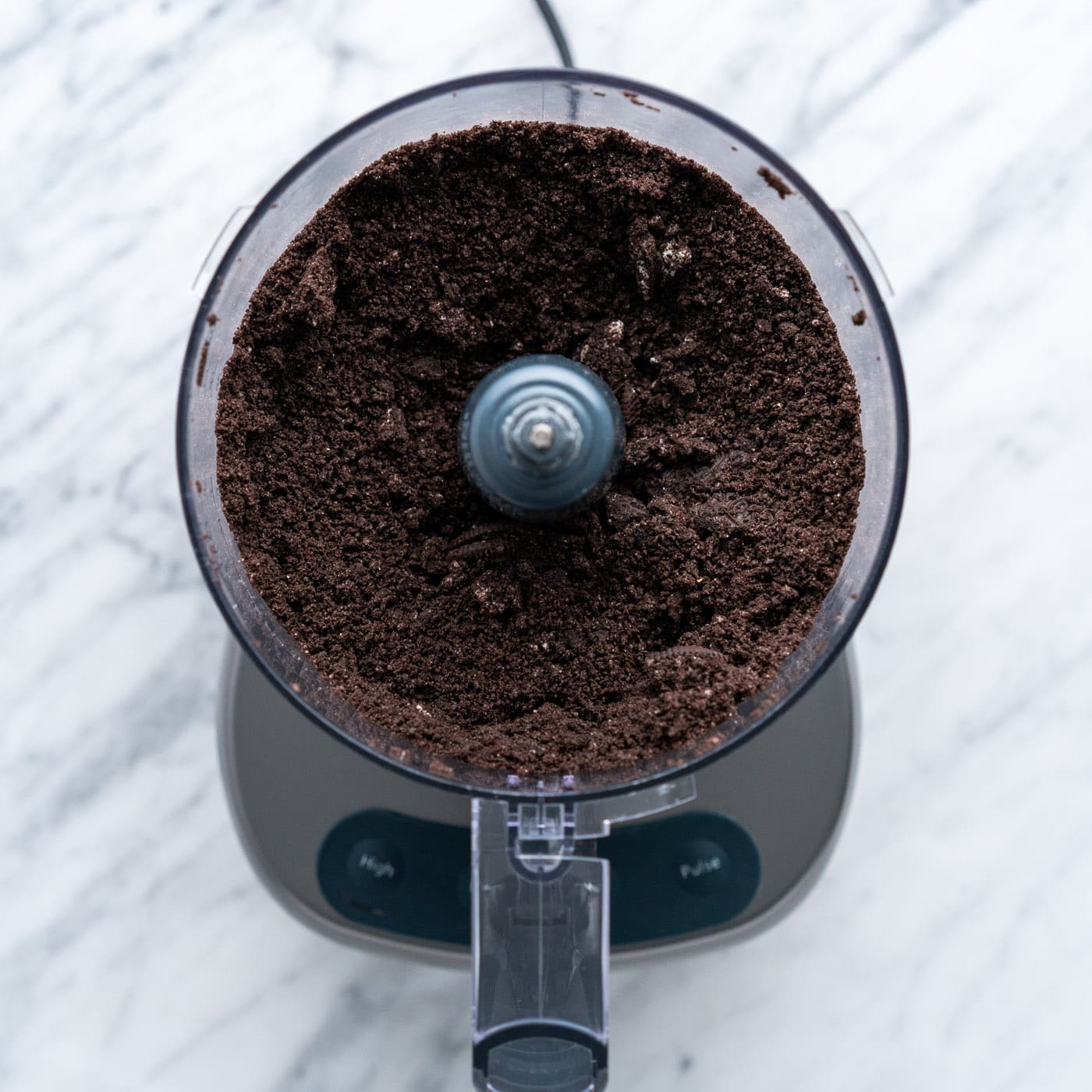 Oreos pulsed into a crumb in a food processor