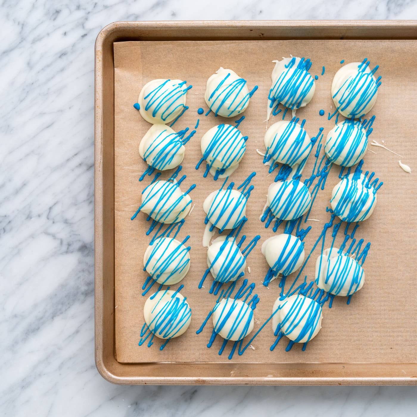 blue drizzle over oreo truffles