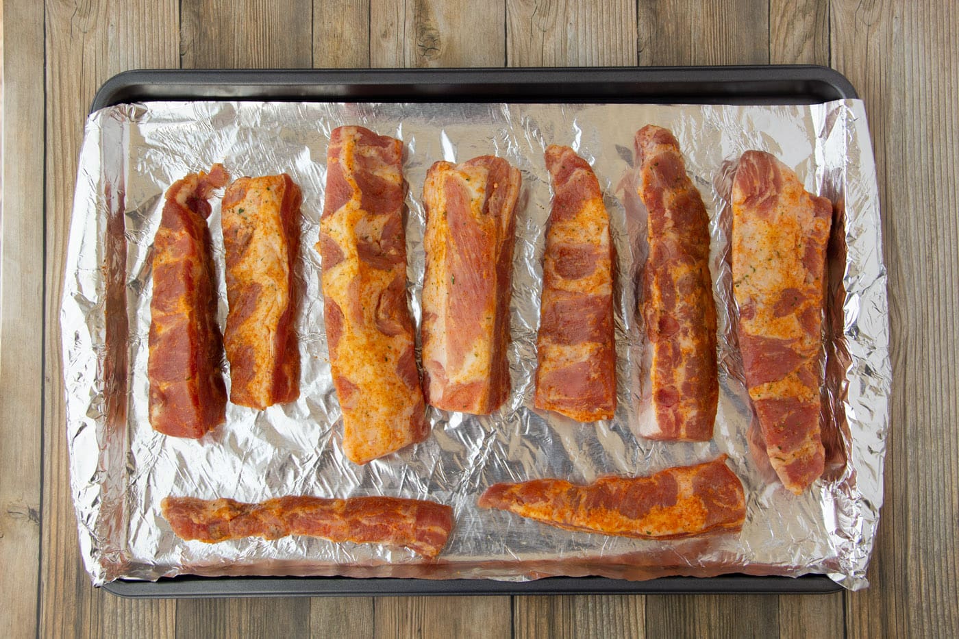 rib tips on a baking sheet