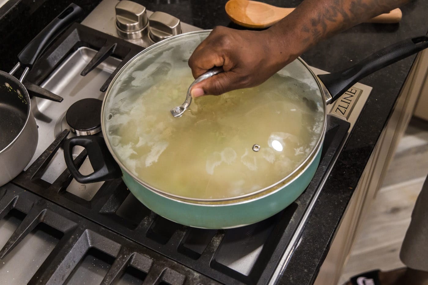 covering rice pilaf in a skillet