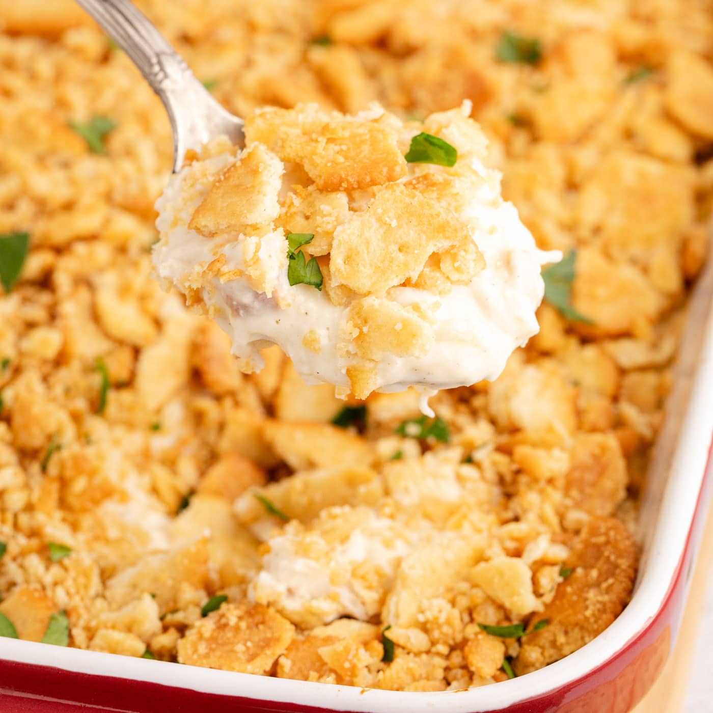 Closeup photo of a spoonful of Ritz Cracker Chicken Casserole