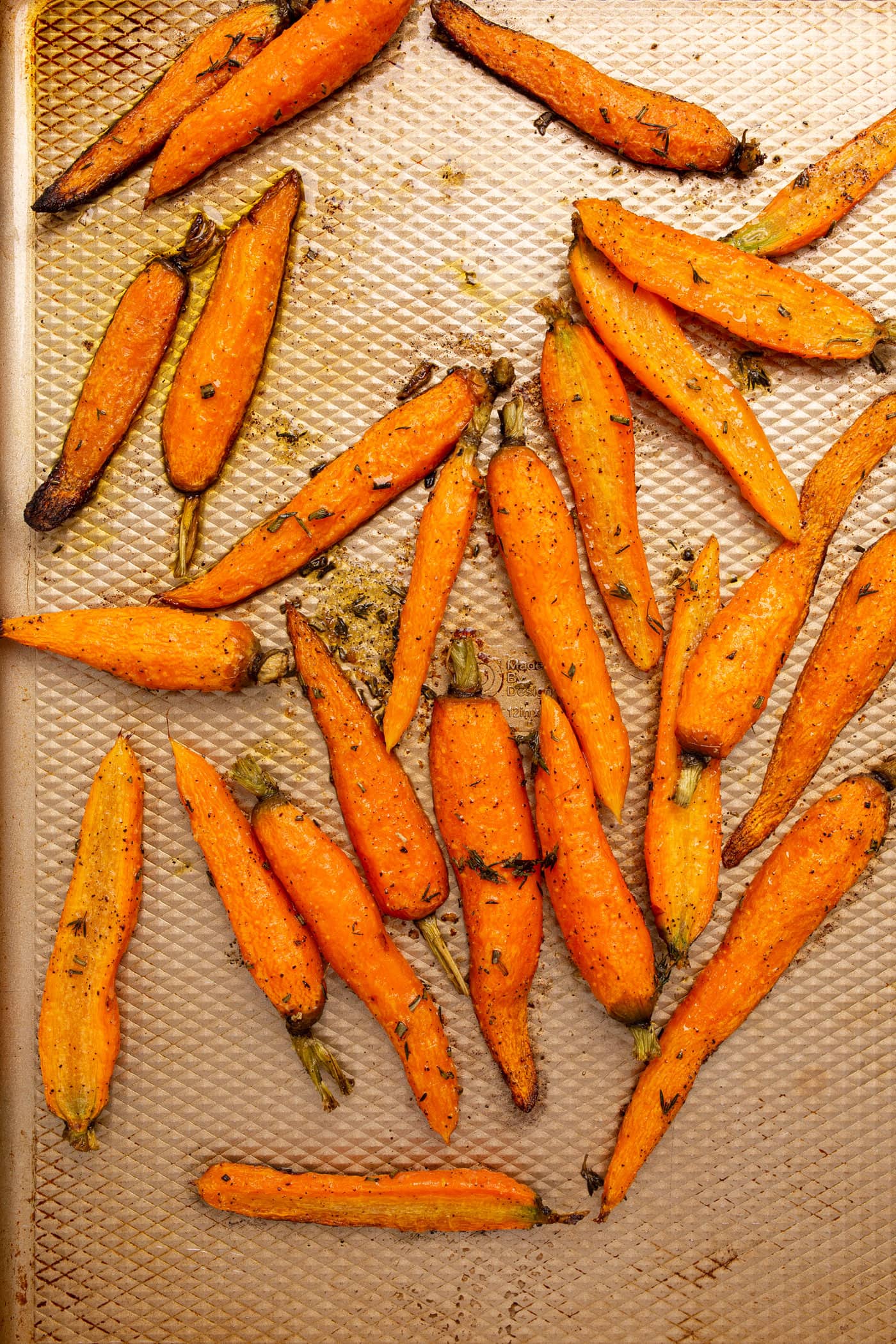 roasted carrots on a baking sheet