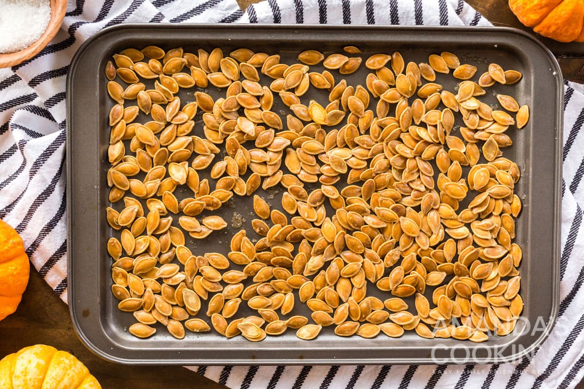 pan full of roasted pumpkin seeds
