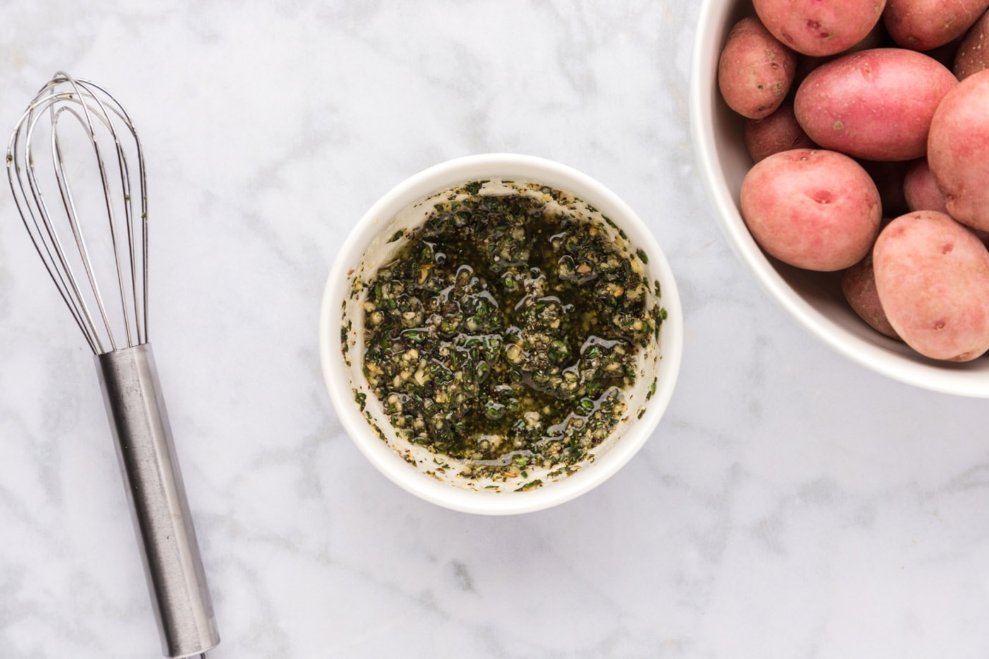 olive oil mixed with seasonings in a bowl