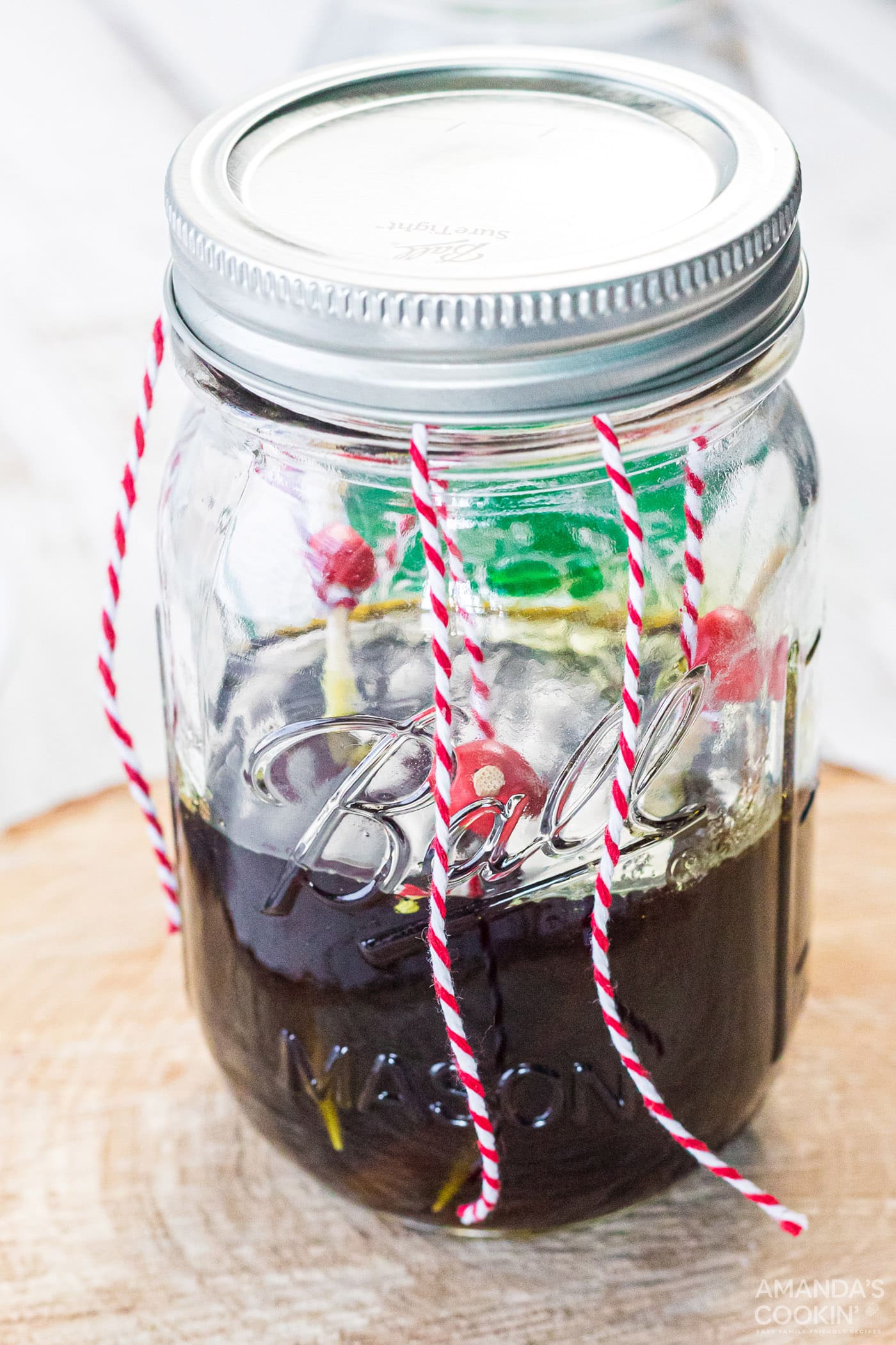 closed jar with rock candy inside
