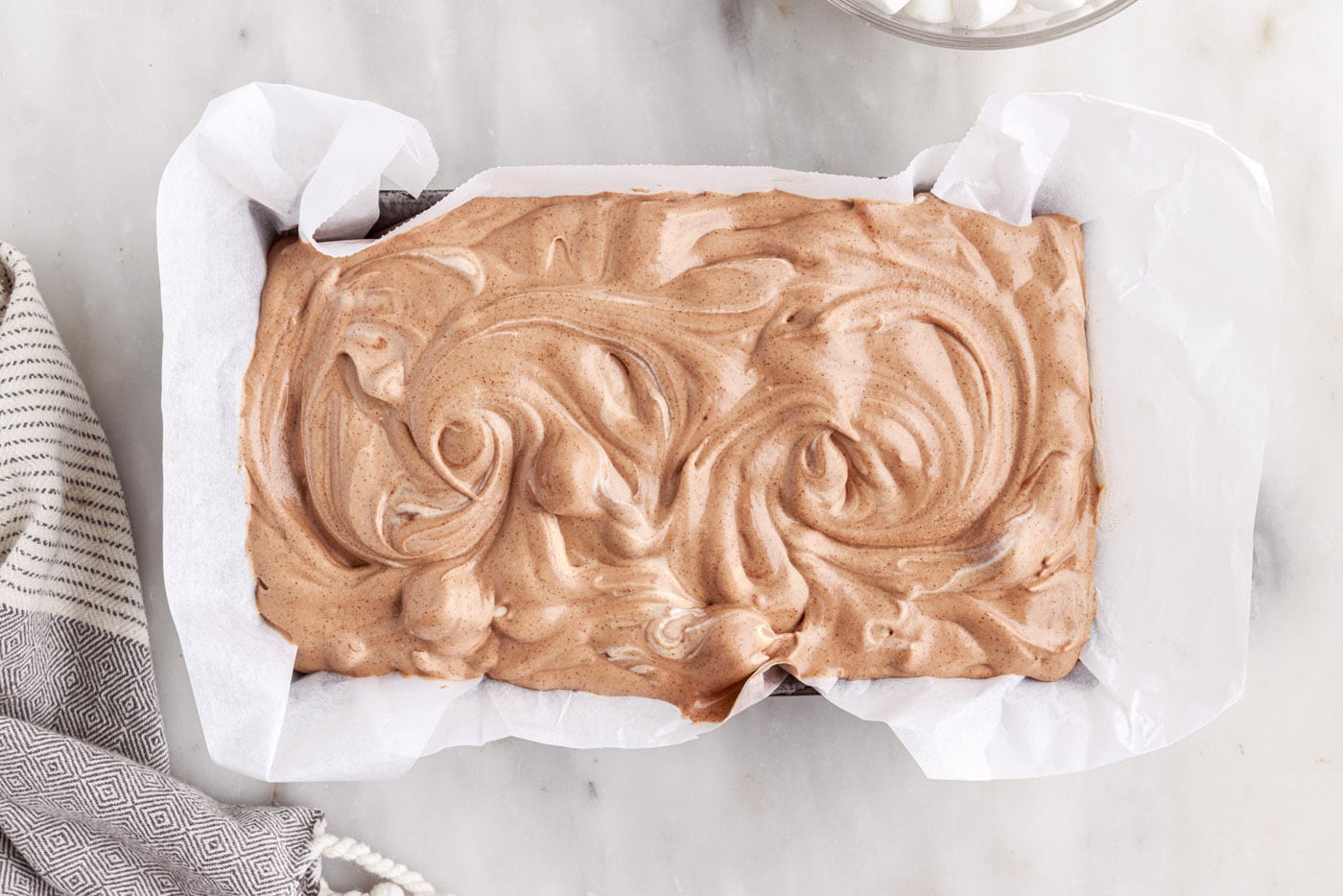 rocky road ice cream swirled in a pan
