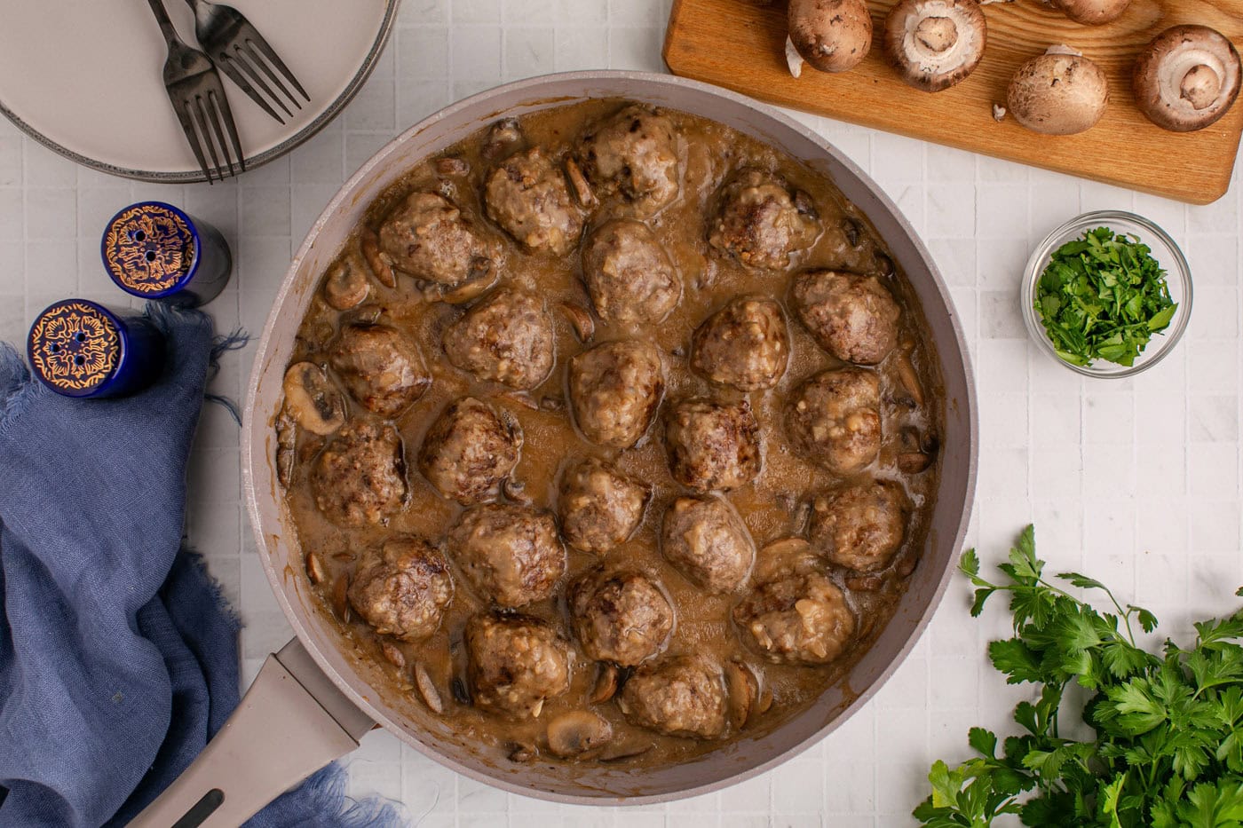 finished overhead of salisbury steak meatballs in a skillet