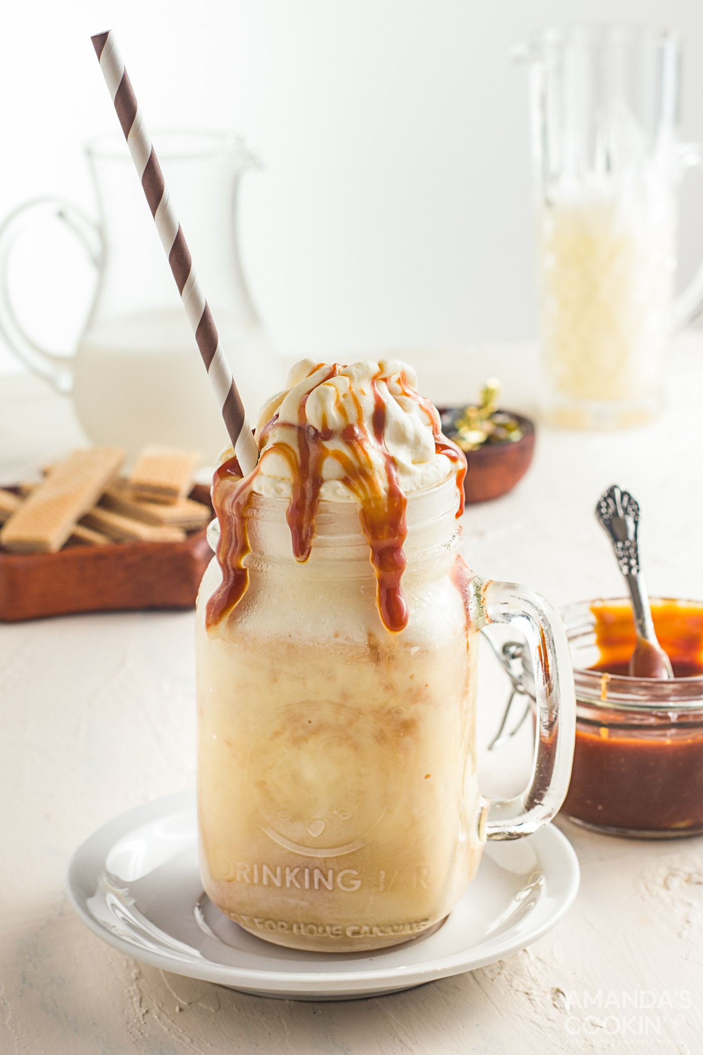 salted caramel milkshake in a mason jar glass