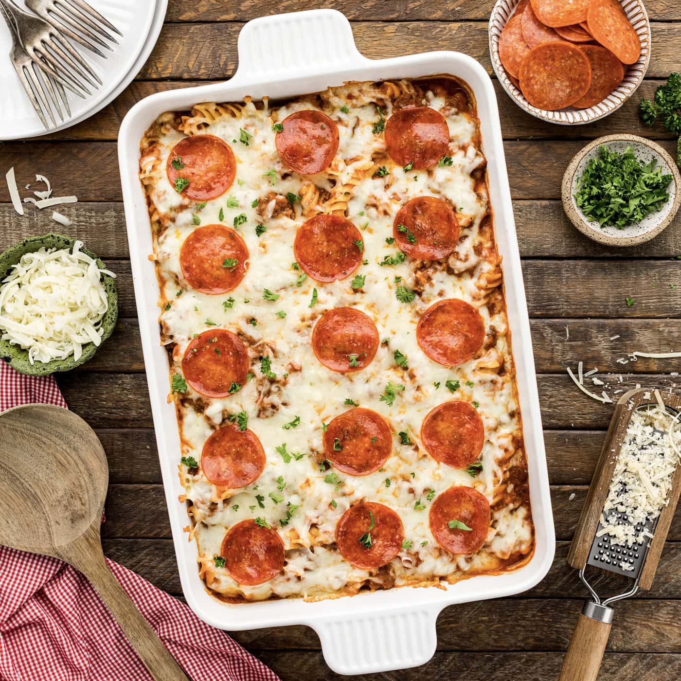 Close up photo of a casserole dish of Sausage & Pepperoni Pizza Casserole