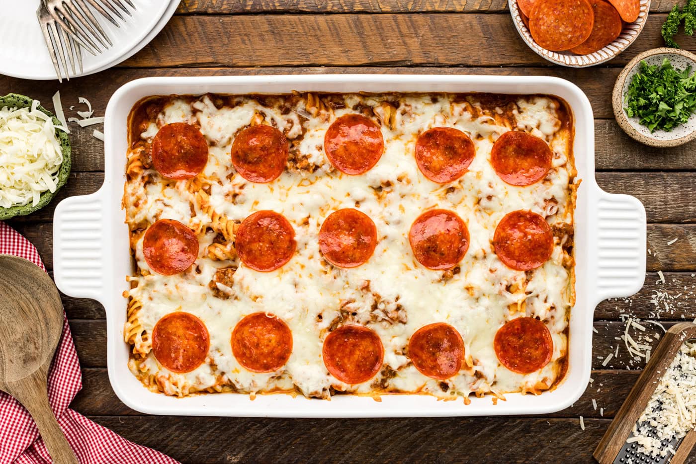 overhead of baked pizza casserole in a baking dish