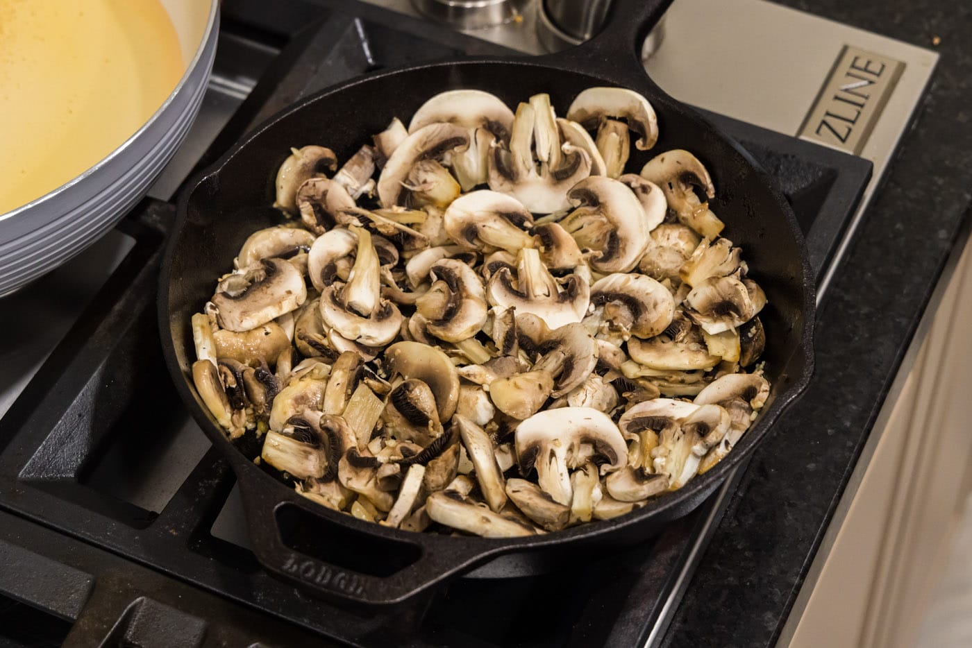 sliced mushrooms in a skillet