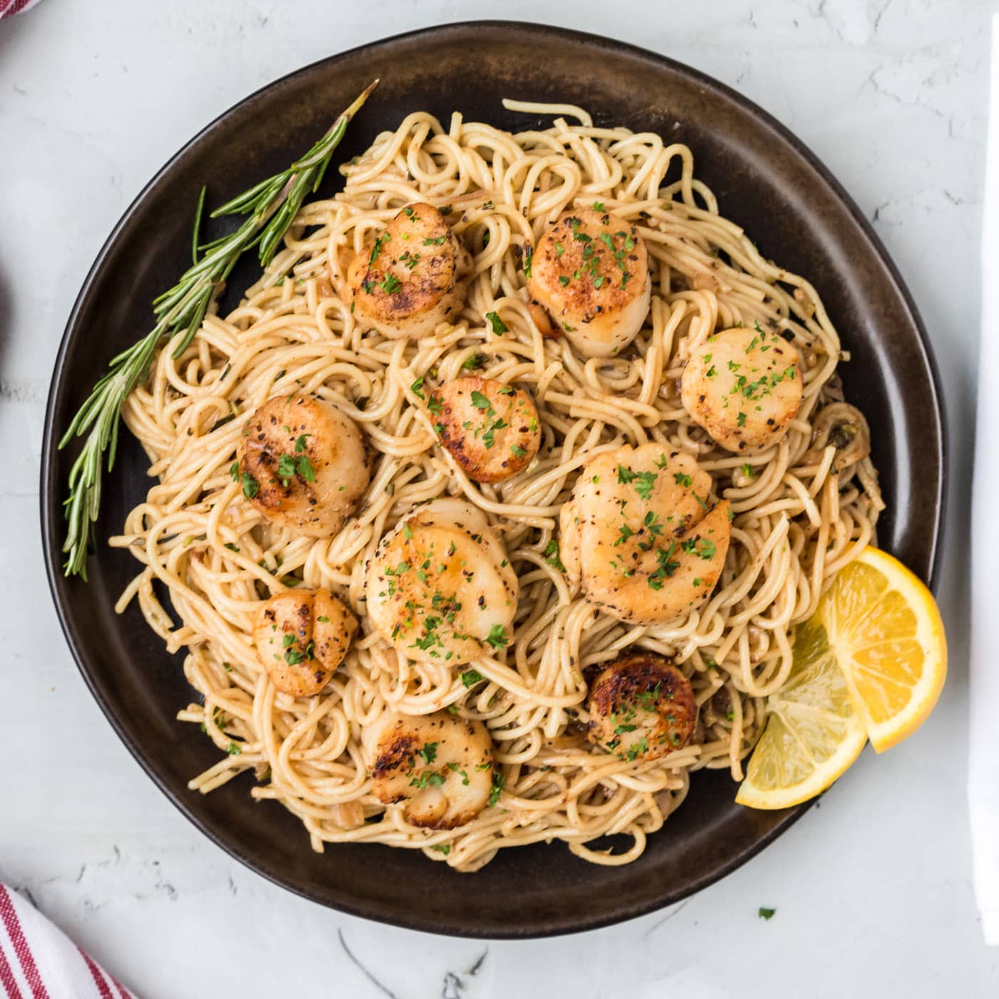black plate of Scallop Pasta