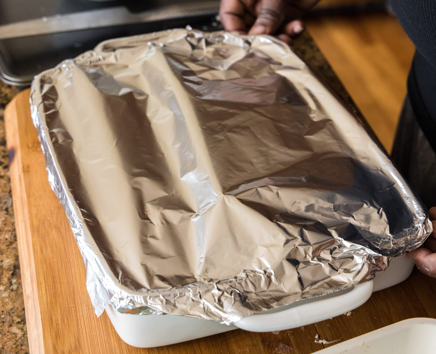 seafood lasagna covered with foil