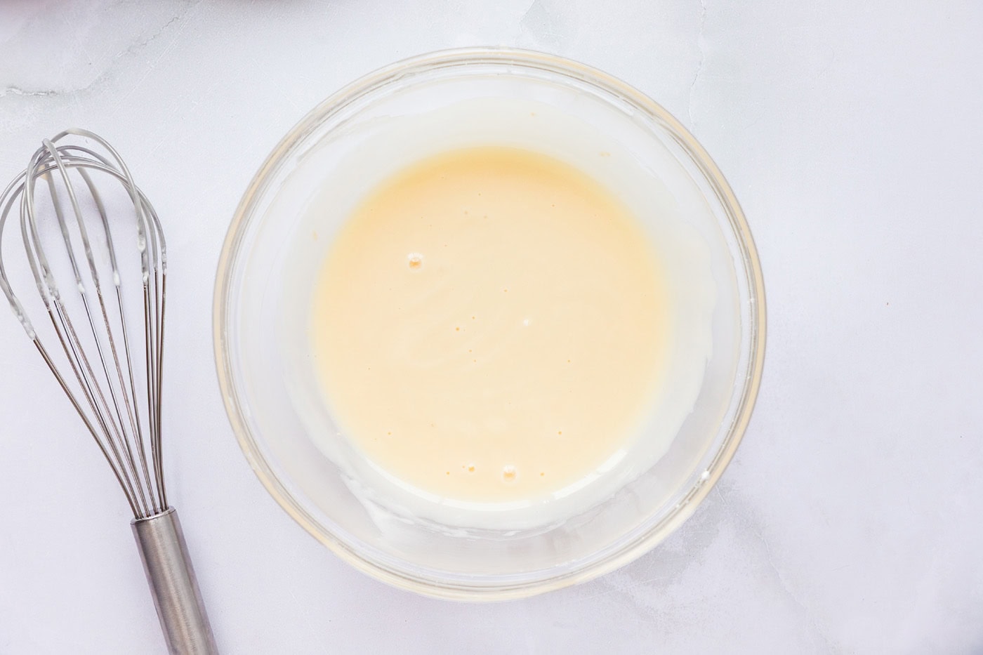 sour cream glaze mixed together in a bowl