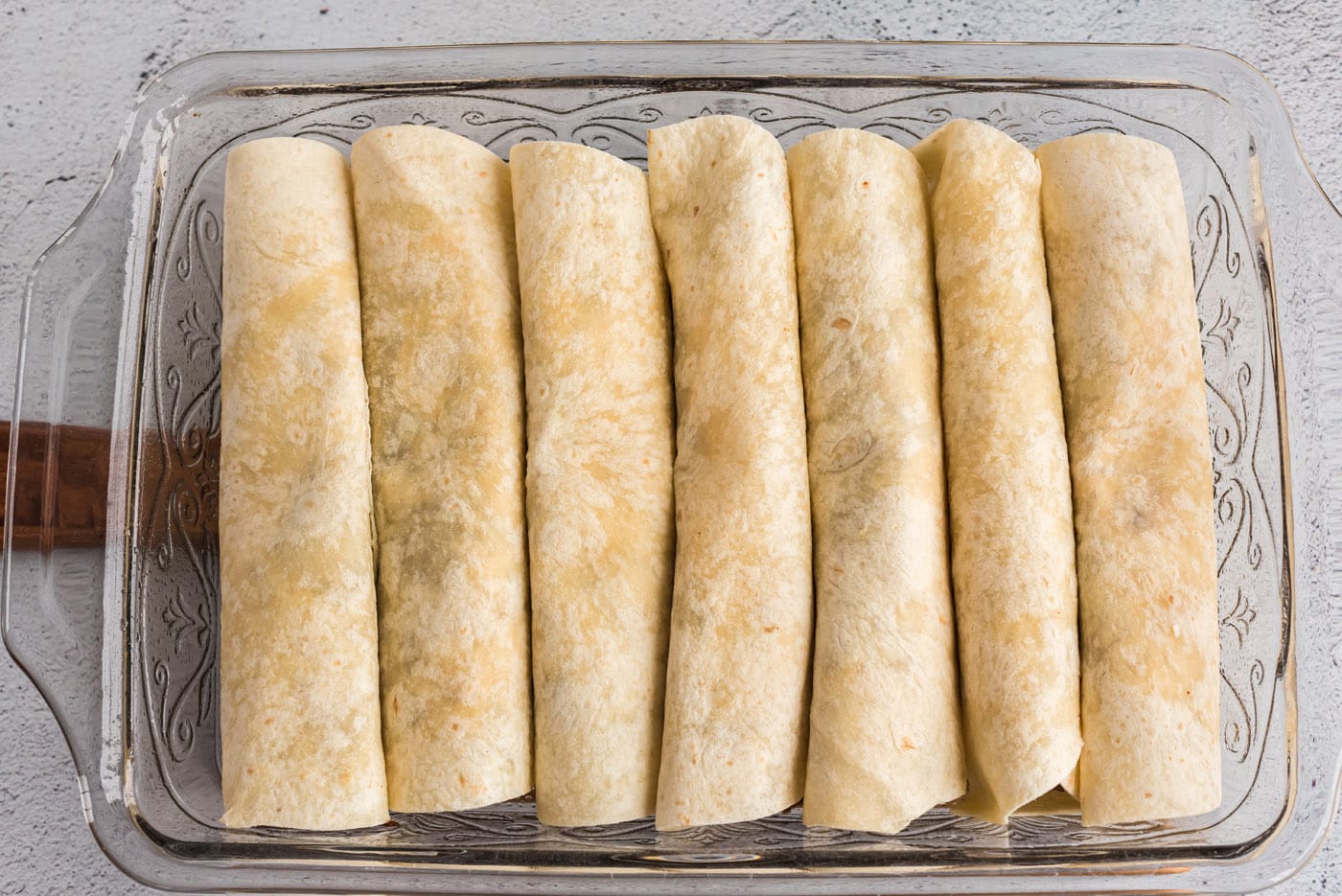 beef enchiladas in a pan