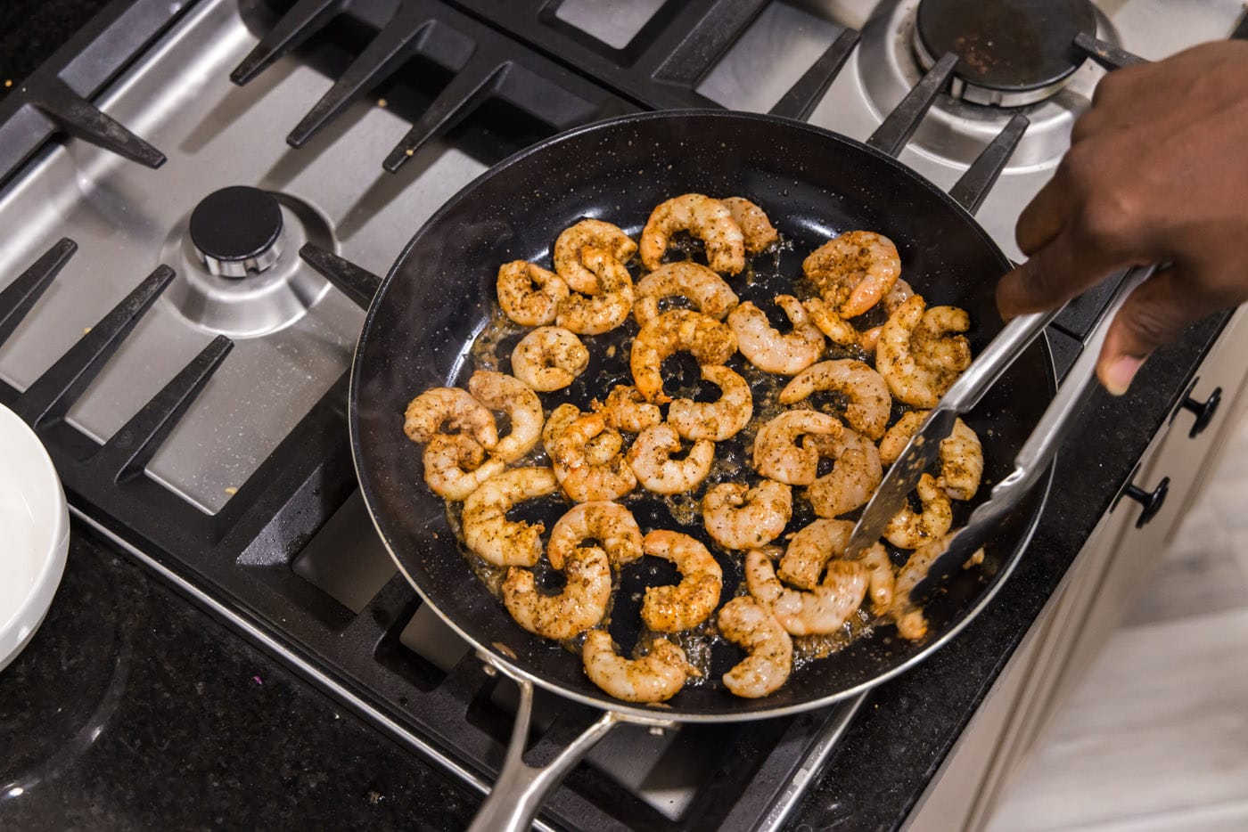 shrimp cooking in a skillet
