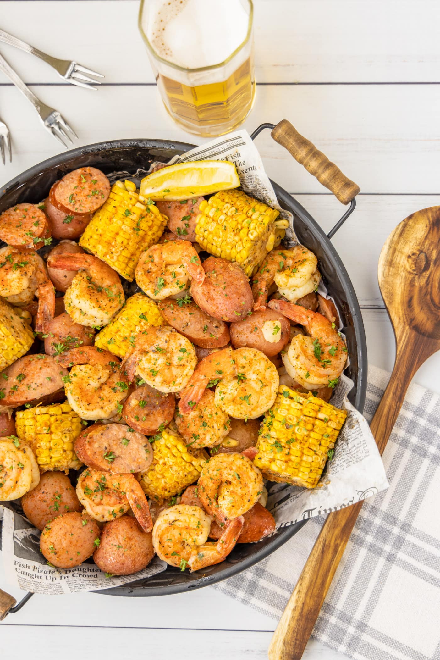 Shrimp Boil with beer and a spoon