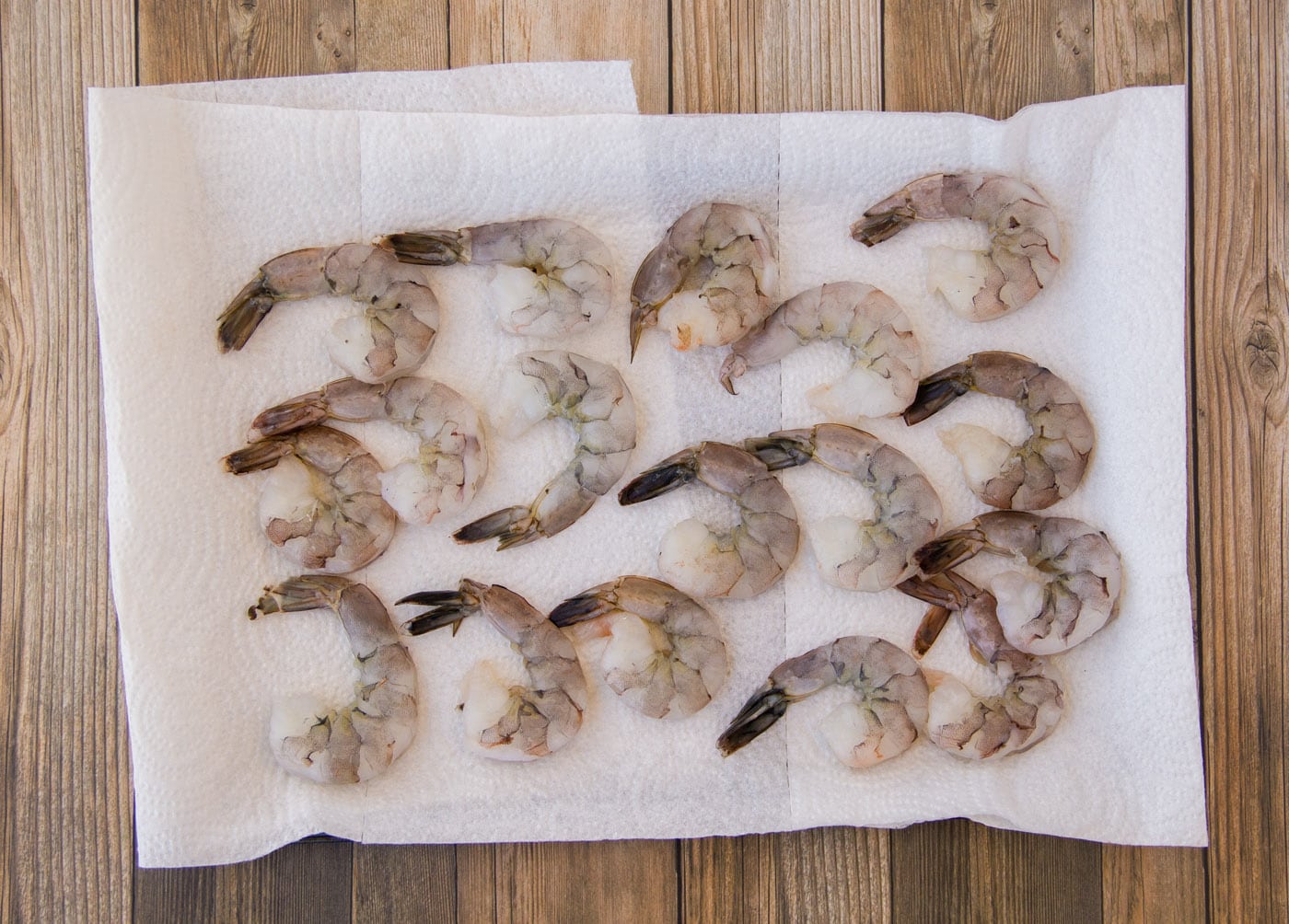 raw shrimp on a paper towel