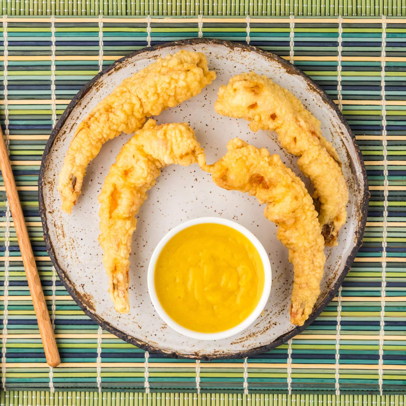 Shrimp Tempura on a plate with dipping sauce