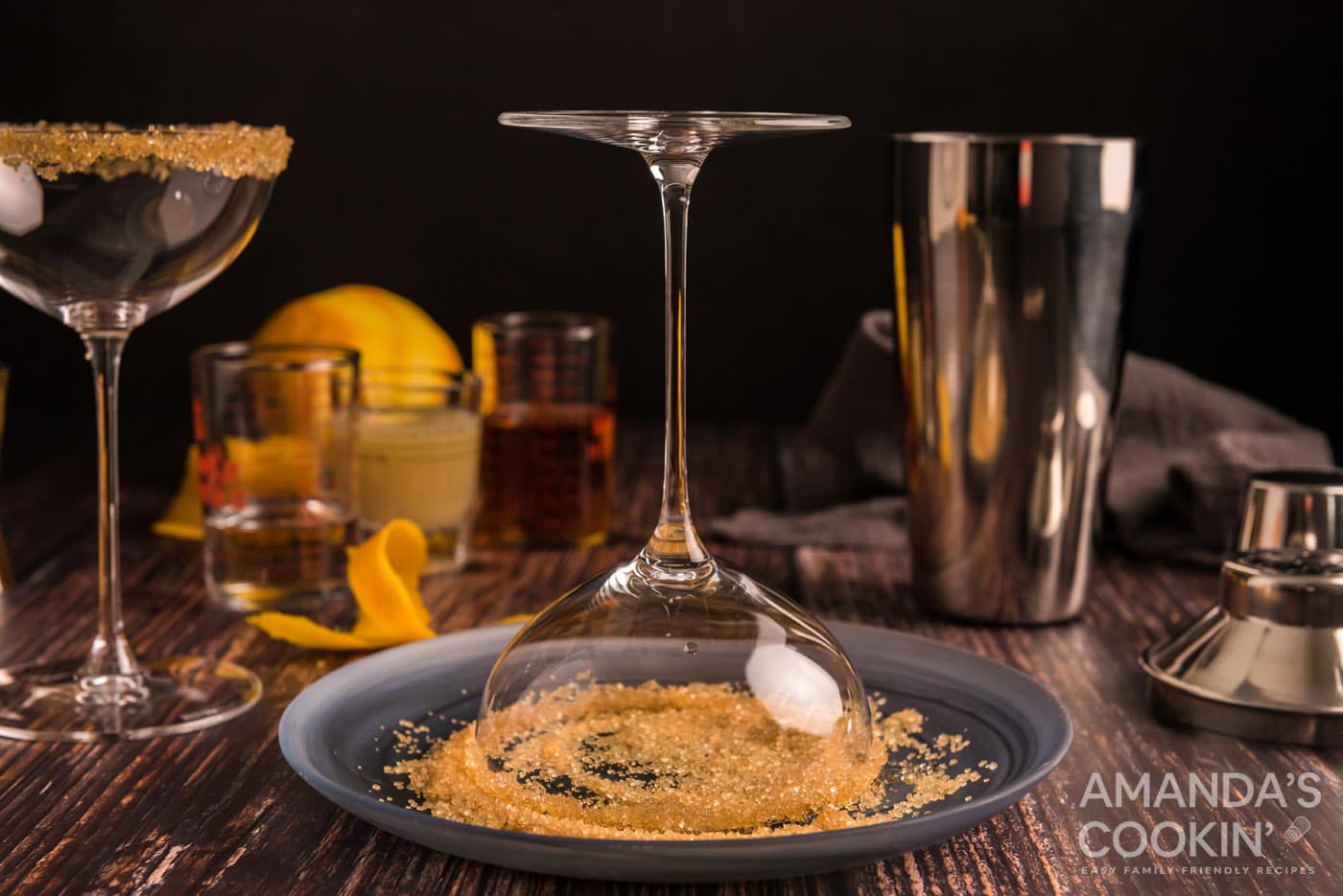 dipping cocktail glass into sugar