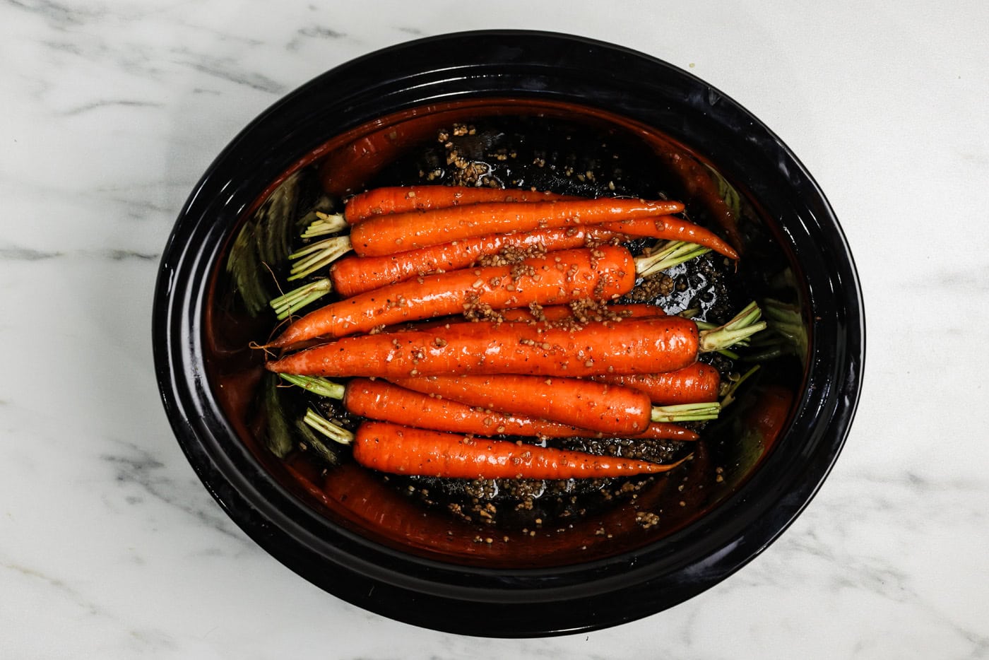 carrots in a slow cooker ready for lid
