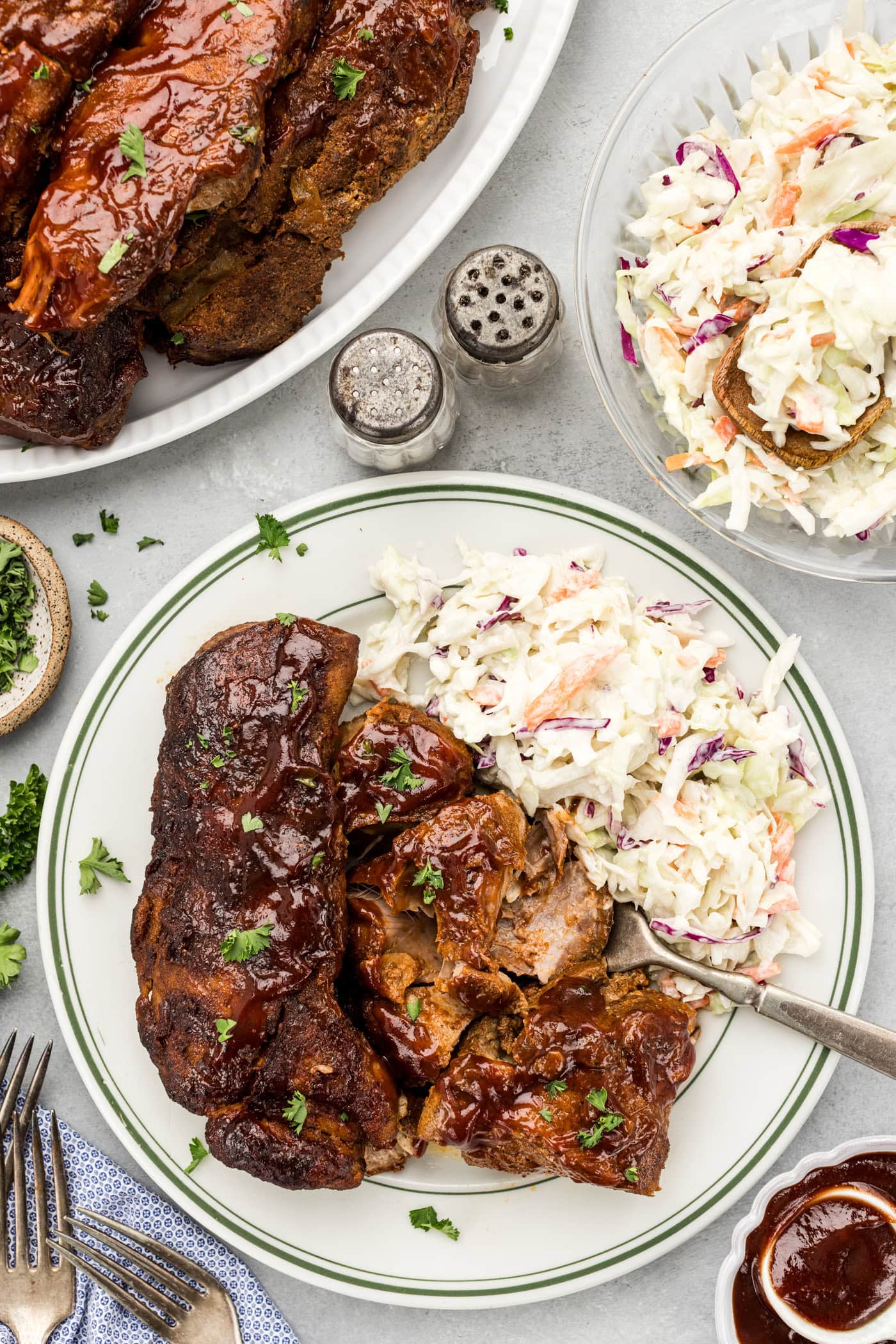 Slow Cooker Barbecued Country Style Ribs plated with coleslaw