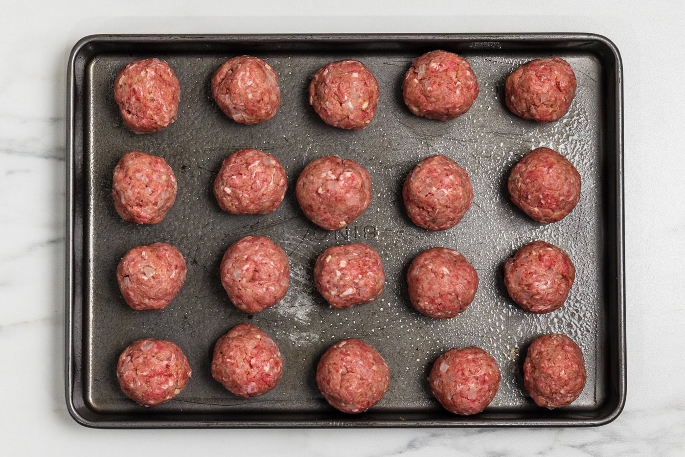meatballs on baking sheet