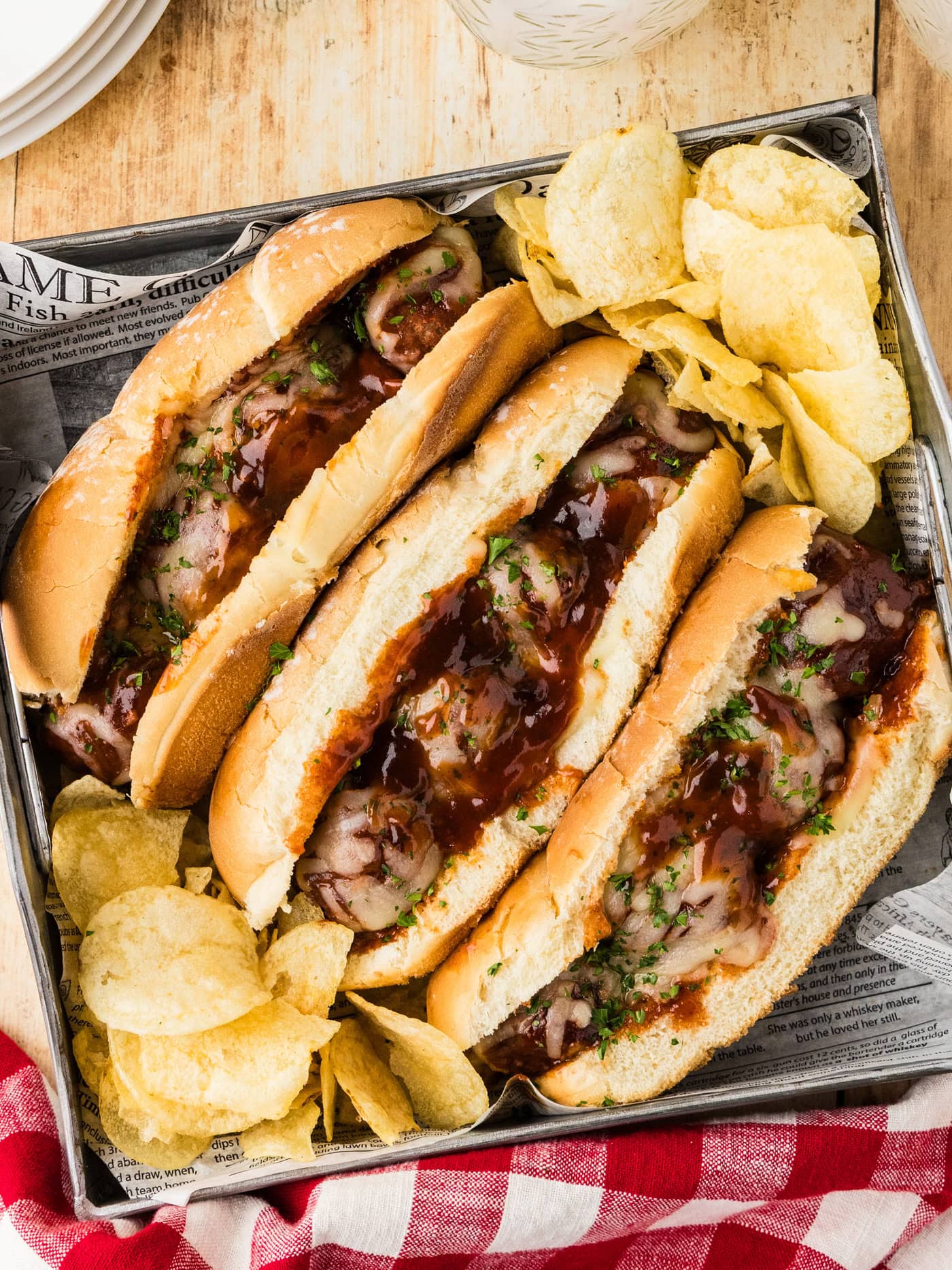 overhead photo of Slow Cooker BBQ Meatball Subs in a tray