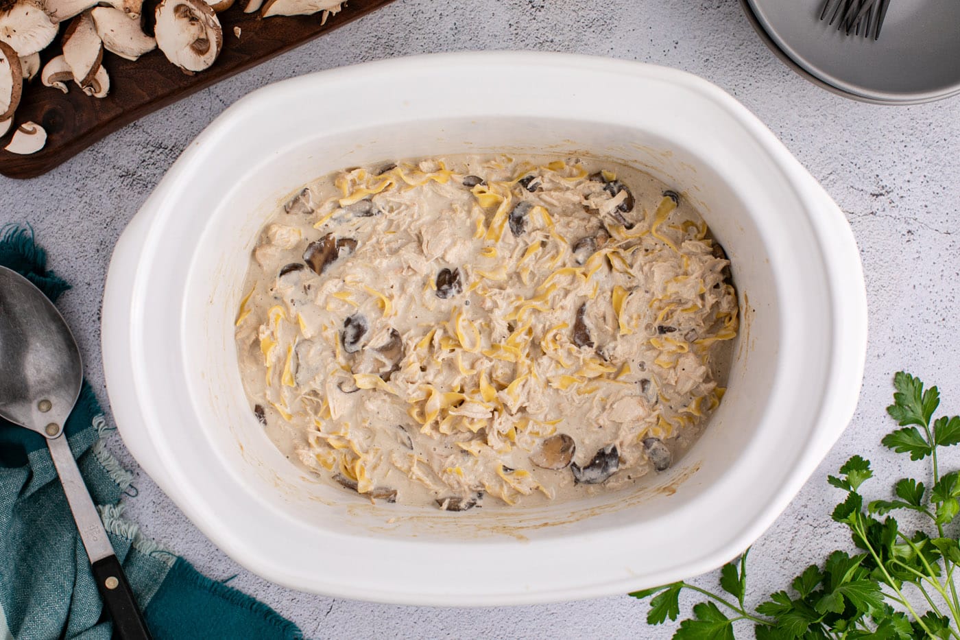 egg noodles added to chicken stroganoff in the slow cooker