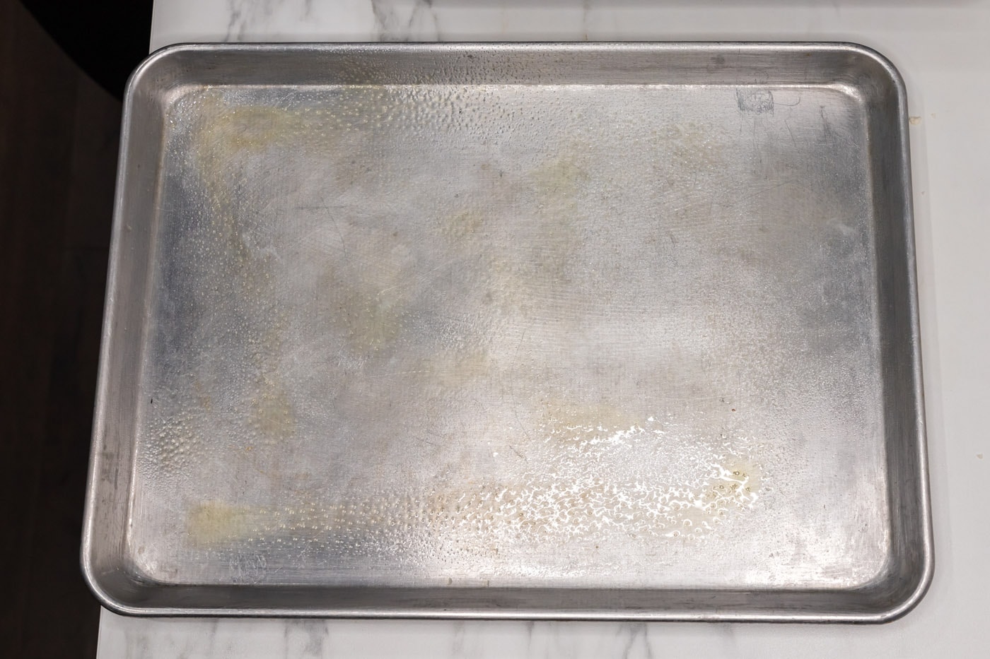 baking sheet sprayed with cooking spray