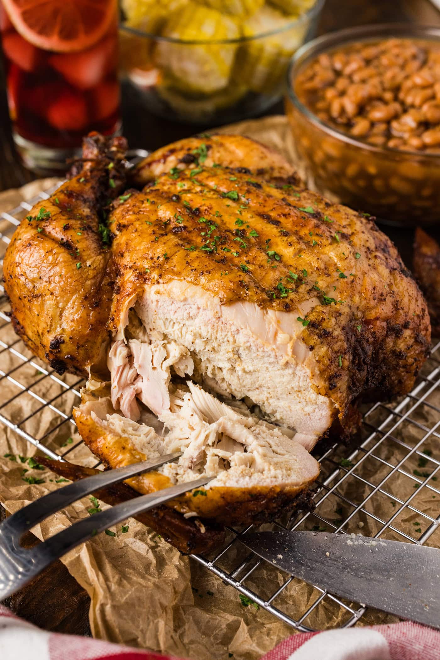 Close up photo a Smoked Chicken with a piece cut off
