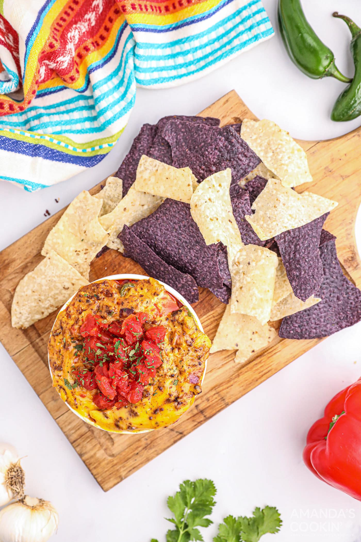 Smoked Queso Dip in bowl with chips