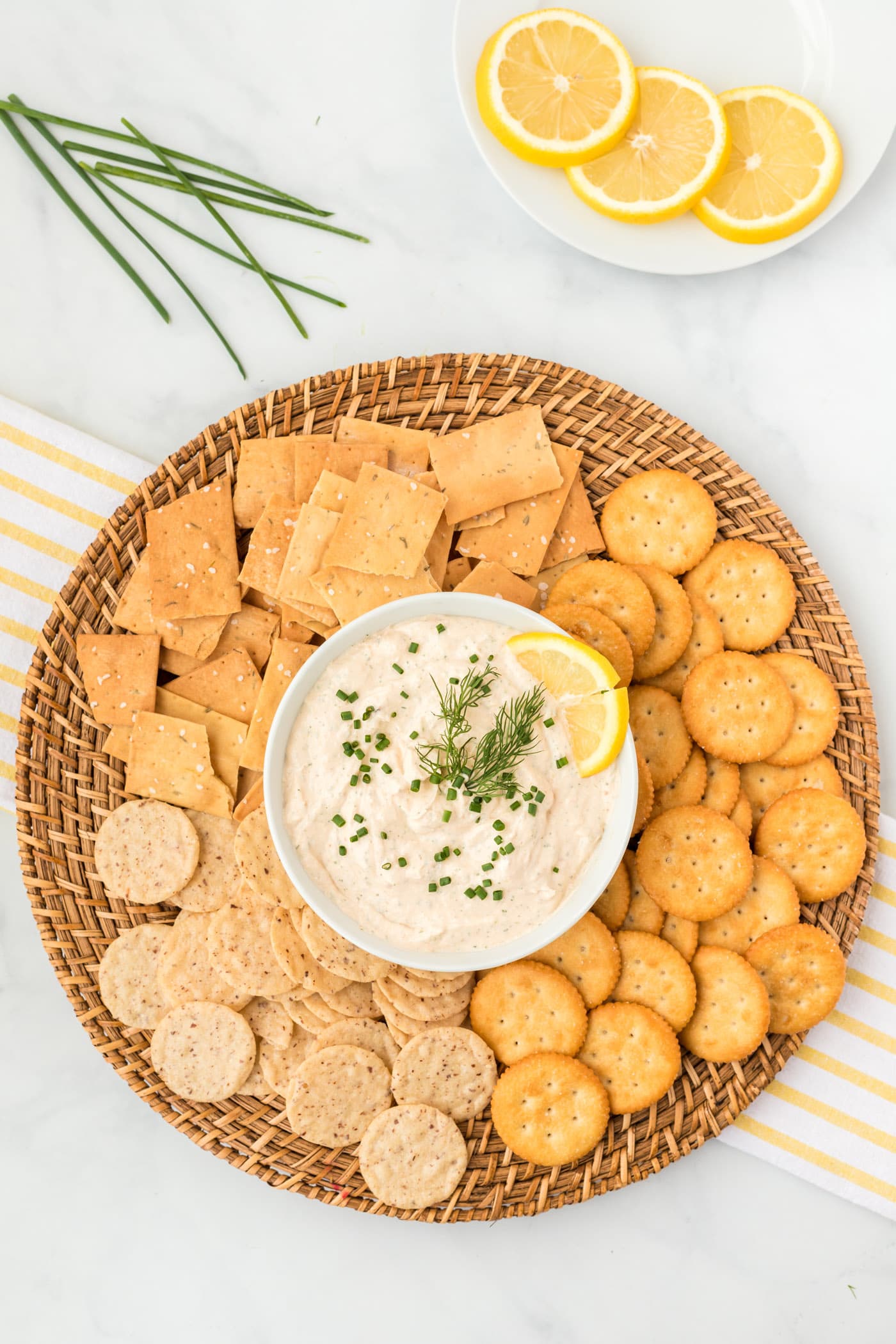 Smoked Salmon Dip in a bowl surrounded by crackers