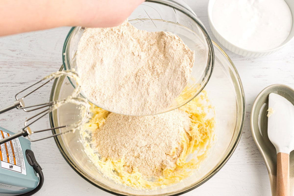 adding grahama cracker mixture to butter mixture